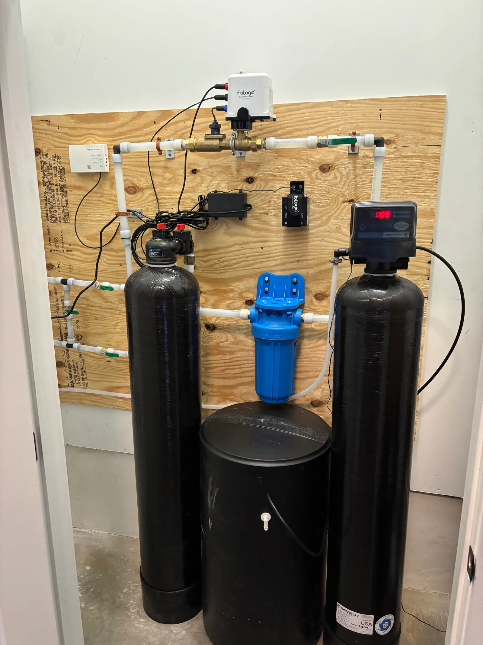 Whole home water filtration and softener system installed in a Leeds, Alabama basement